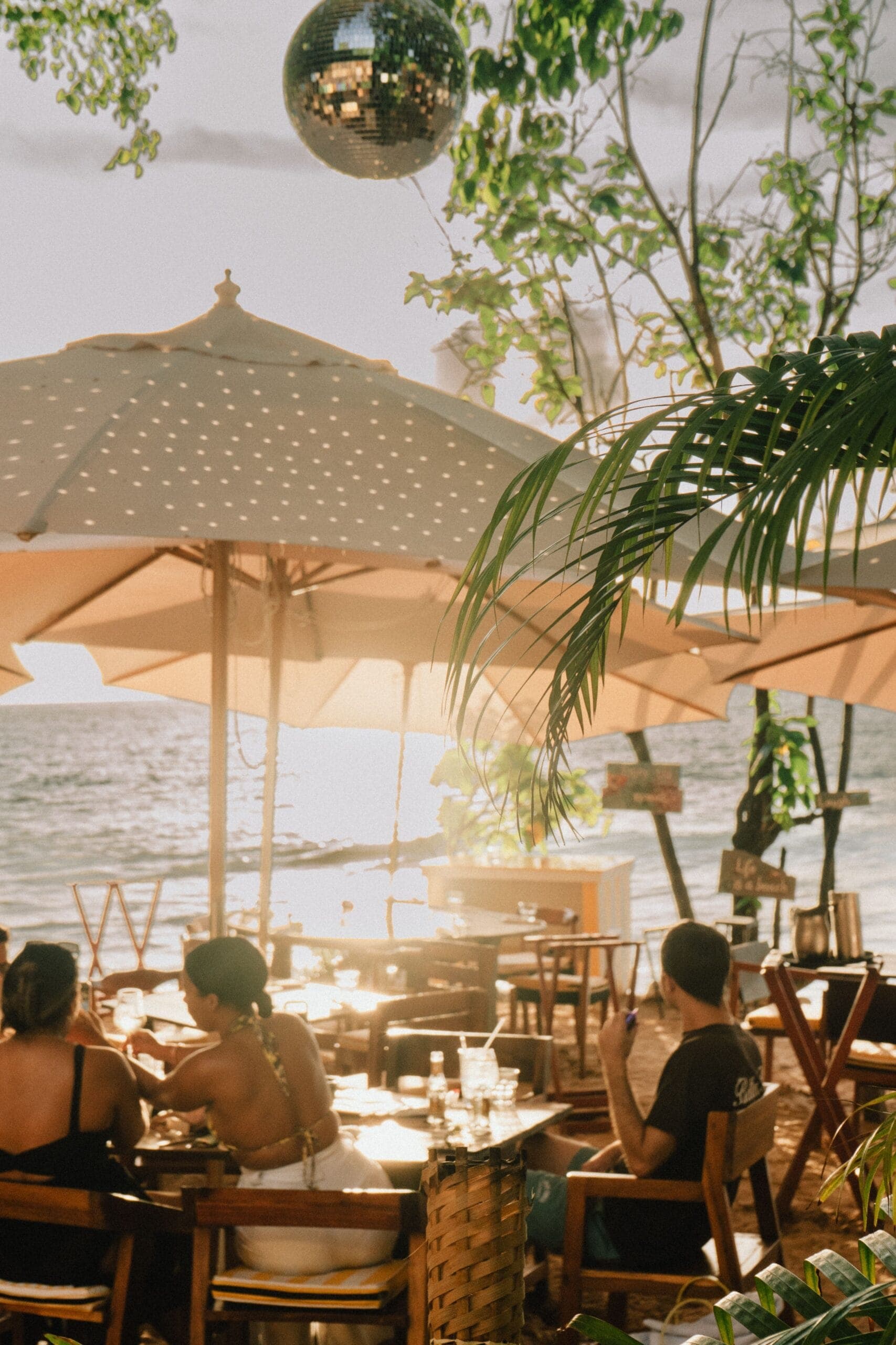 Seaside tables and umbrellas at La Cabane, Barbados